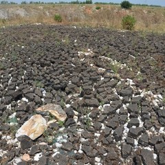 Cava-discarica a fuoco