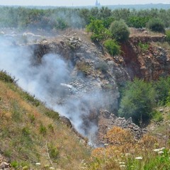 Cava-discarica a fuoco