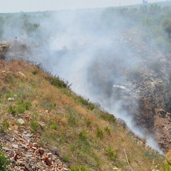 Cava-discarica a fuoco