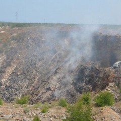 Cava-discarica a fuoco