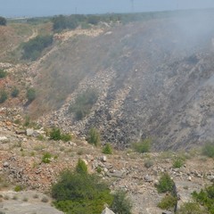 Cava-discarica a fuoco