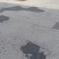 Buche rattoppate, il quartiere di via Andria non ci sta