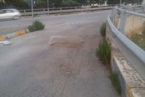 Viale Germania pieno di buche