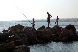 Pescatori sugli scogli